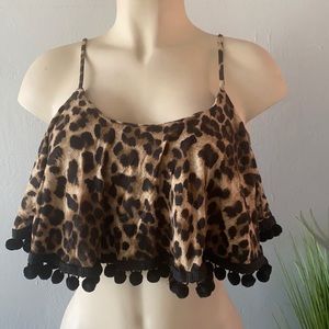 A cute poncho crop top made In Honolulu